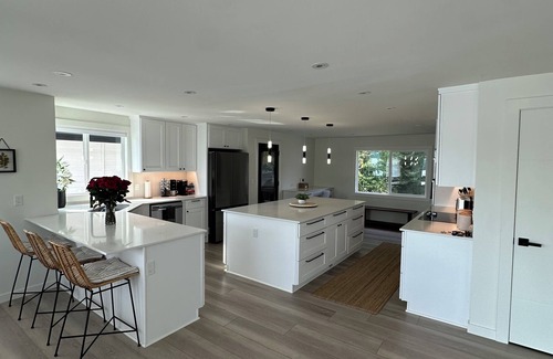 Bonney Lake Casa | Lakefront Retreat with Private Dock's, Stunning Views, fireplaces and hot tub!