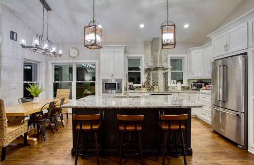 Flowery Branch Casa | Lakefront, Saltwater Pool, Backyard Oasis, Private Dock, Home Gym