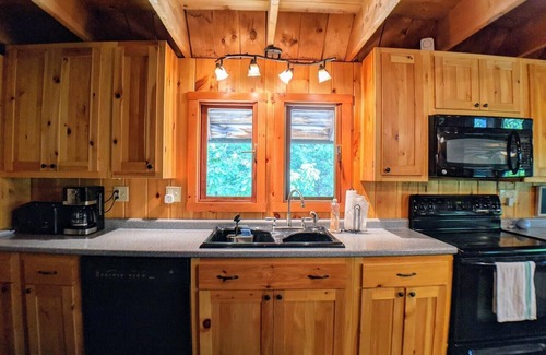 Meredith Casa | Lakes End Log Cabin on Lake Wicwas!
