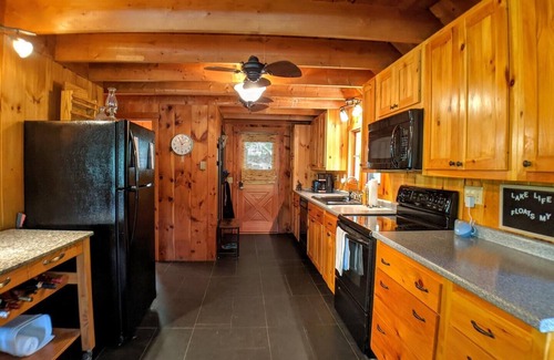 Meredith Casa | Lakes End Log Cabin on Lake Wicwas!