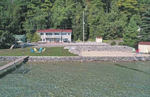 Lake Township Casa | Lakeside family paradise 140ft private Crystal Lake Frontage