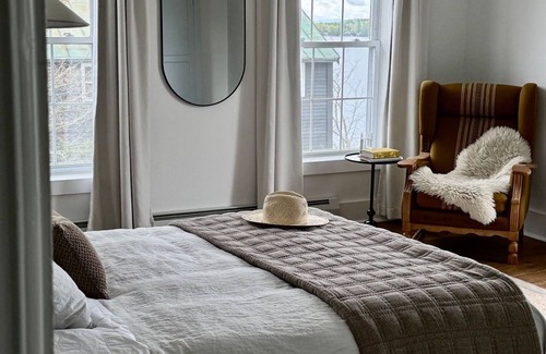 Rome Cabina | Lakeside Lodging, Elevated - Walk to Village shops and restaurants and enjoy a private lakefront, newly renovated and furnished 1843 home!