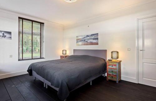 Ouddorp Villa | Landgoed Hermitage - Villa Euphoria - XXL Zwemspa - Max 10 personen