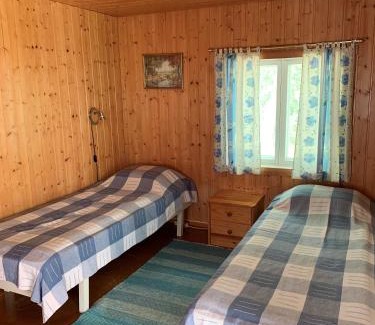 Puumala Chalet De Esquí | Lappalaisen lomamökit Pihamökki