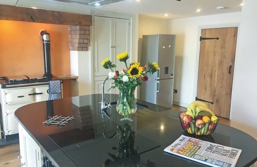 Llangammarch Wells Cabaña | Large detached property with an enclosed garden, perfect for children and pets to enjoy.