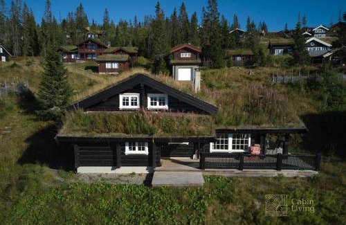 yer Casa | Large family cabin in Hafjell ski in-out, BBQ, terrace and fireplace
