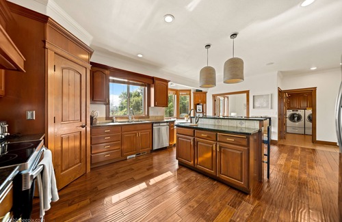 East Central Casa | Large luxury home! Views! Hot tub! Game room! EV charger! Pool table! Grill!