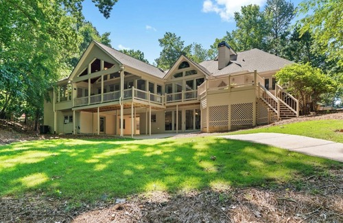 Flowery Branch Casa | Large Luxury Lake Home with Private Dock, Pet Friendly, Hot Tub