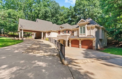 Flowery Branch Casa | Large Luxury Lake Home with Private Dock, Pet Friendly, Hot Tub