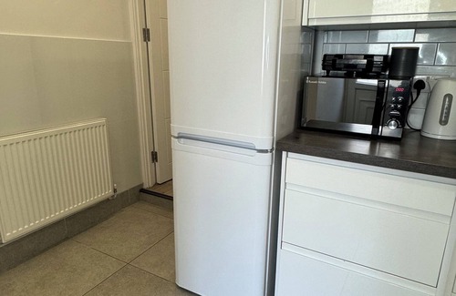 West Ham Casa | Large room with access to the garden