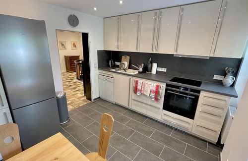 Lenggries Condominio | Large vacation apartment with sauna, terrace, garden and open fireplace