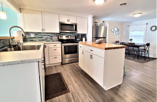 Cedar Point Casa | Large Waterfront Home with private dock and hottub, 3 miles to Emerald Isle Beach