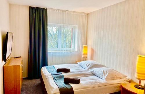 Slupsk Apartamento | LAS SŁUPSKI PREMIUM BUSINESS APARTAMENT NR 7 Wifi Netflix Smart TV50 two bedrooms two extra large double beds up to 6 people full pleasure quality stay