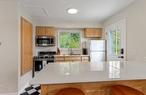 Lauderdale Lakes Casa | Lauderdale Lakefront Oasis |Views Throughout |Huge Lakefront Deck |Splash Pad & Paddle Boards |Dock