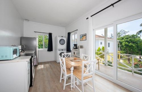 Governor's Harbour Apartamento | Laughing Bird 2BR #5 - Brand New Stylish Apartment, Pool and Bea condo
