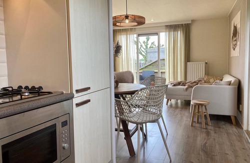 Anjum Casa | Casa de vacaciones 'Lauwers Loft' (4 pers.) con terraza en el lago Lauwersmeer