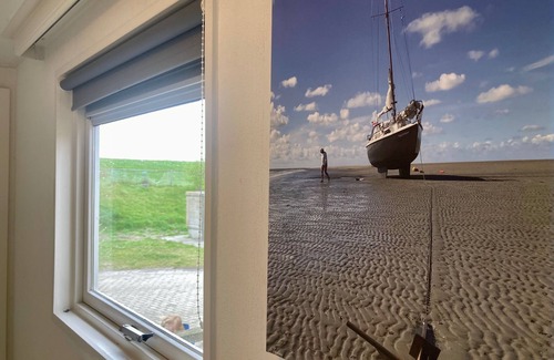 Anjum Casa | Casa de vacaciones 'Lauwers Loft' (4 pers.) con terraza en el lago Lauwersmeer