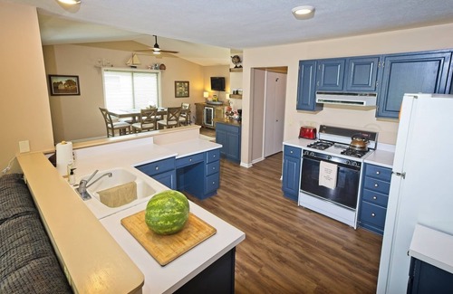 Prudenville Cabaña | Lazy Waves Lodge, A waterfront canal cottage retreat on Houghton Lake
