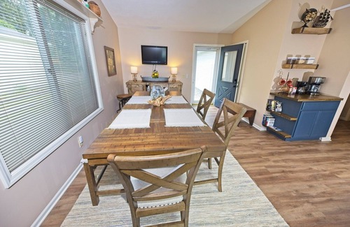 Prudenville Cabaña | Lazy Waves Lodge, A waterfront canal cottage retreat on Houghton Lake