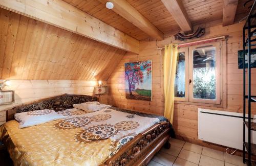 Montoldre Casa | Le Chalet Boisé - Maison avec jardin clôturé