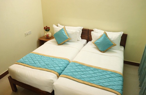 Kalapettai Cama Y Desayuno | Le Ideal Suites