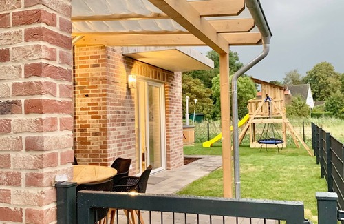 Butjadingen Apartamento | Left half of the house Lea for 10 people - dream house on the North Sea with 2 bedrooms