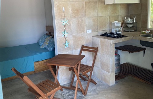 El Palmar Cabaña | Lemon House: Cabaña de playa acogedora y completa de una habitación.