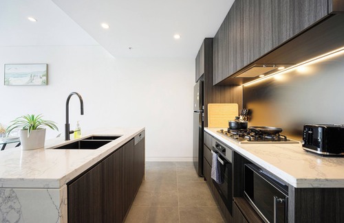 Lidcombe Apartamento | Lidcombe Chic 1-bedroom apartment with fitness room and pool