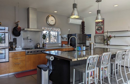 La Cienaga Casa | Light-filled main house close to town; views, hiking on high desert behind house