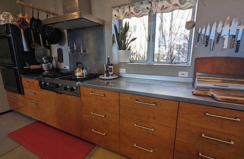 La Cienaga Casa | Light-filled main house close to town; views, hiking on high desert behind house