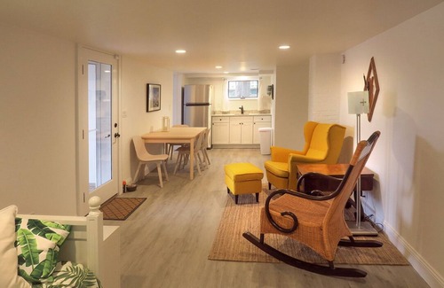 Riverhead Casa | Light rippling on river, private dock, nature preserve beyond