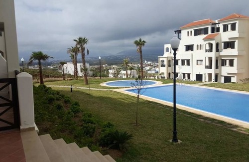 Cabo Negro Apartamento | Lilac's garden Vue piscine