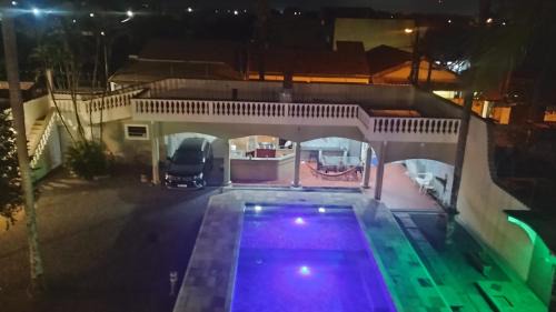 Itanhaem Casa | Linda Casa de praia com Super piscina 12x5 Novinha com 3 níveis, Wi-Fi, Tv led,jardim , churrasqueira completa