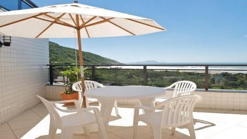 Ingleses Norte Apartamento | Linda cobertura frente mar com piscina privativa e pé na areia!