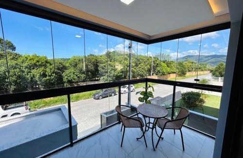 Governador Celso Ramos Apartamento | Lindo apartamento a 400 metros da praia com selo azul de qualidade