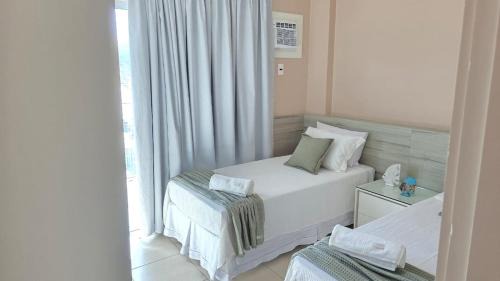 Prainha Apartamento | Lindo apartamento frente mar na Prainha com Ar Condicionado, Piscina