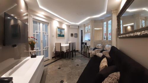 Gonzaga Apartamento | Lindo Flat no Edifício Cosmopolitan, com GARAGEM e PISCINA