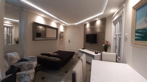 Gonzaga Apartamento | Lindo Flat no Edifício Cosmopolitan, com GARAGEM e PISCINA