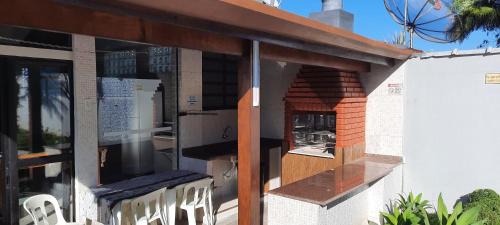 Morada da Praia Casa | Lindo Sobrado com Piscina em Condomínio Fechado