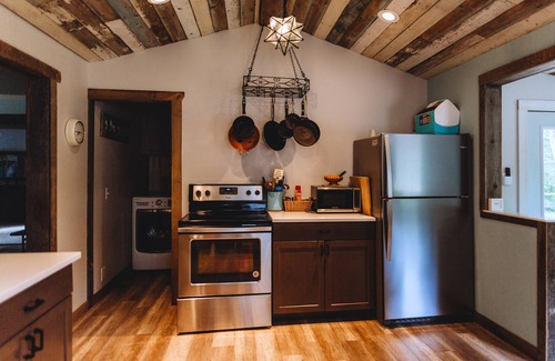 Riverside Cabaña | Little Blue Cottage - wooded getaway, near beaches and towns