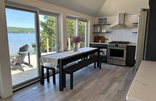 Empire Casa | Little Glen House with 100 feet of frontage, huge deck, dock, and boat mooring