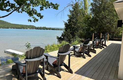 Empire Casa | Little Glen House with 100 feet of frontage, huge deck, dock, and boat mooring