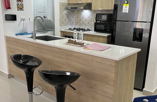 Punal Condominio | LIVERA RD 1 BEDROOM APARTMENT. 10 MINUTES FROM AIRPORT AND HOMS