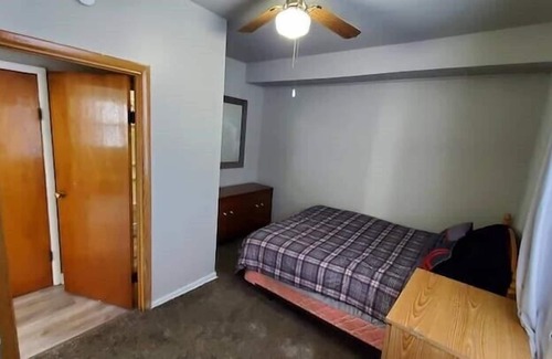 Two Rivers Apartamento | Live. Work. Play. Charming Riverfront Apt in Two Rivers!