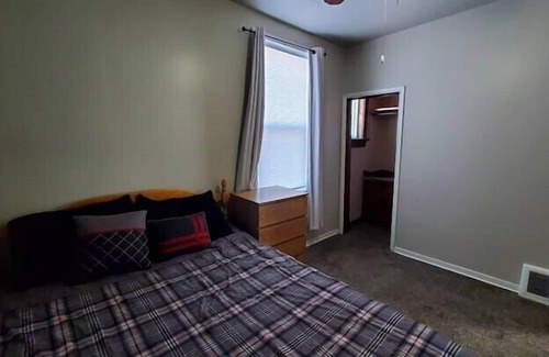 Two Rivers Apartamento | Live. Work. Play. Charming Riverfront Apt in Two Rivers!