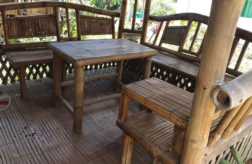Bacnotan Cabaña | Local style cottage in a garden setting - cosy comfort with A/C