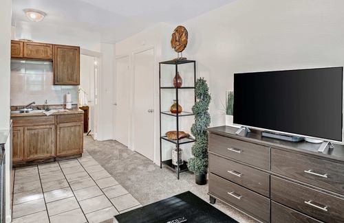 Highspire Apartamento | Location Convenient 1BR with Comfy Sofa and TV