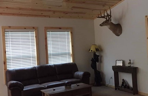 Minocqua Casa | CAZADORES DE MOVIMIENTOS DE NIEVE