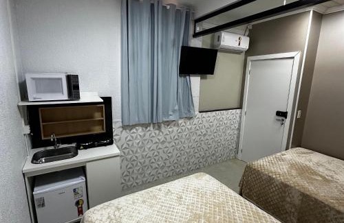 Esplanada Apartamento | Loft Lux SM 02 (Smart TV, Ar condicionado, Cozinha)