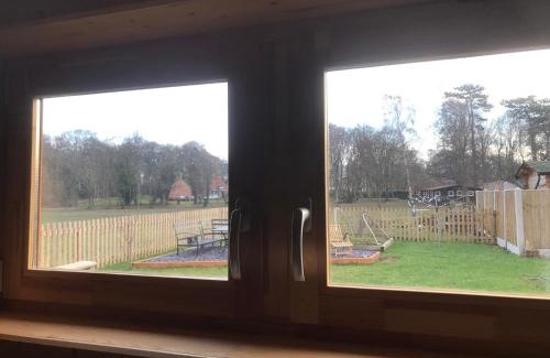 High Ercall Apartamento | Log Cabin in Tiny Village